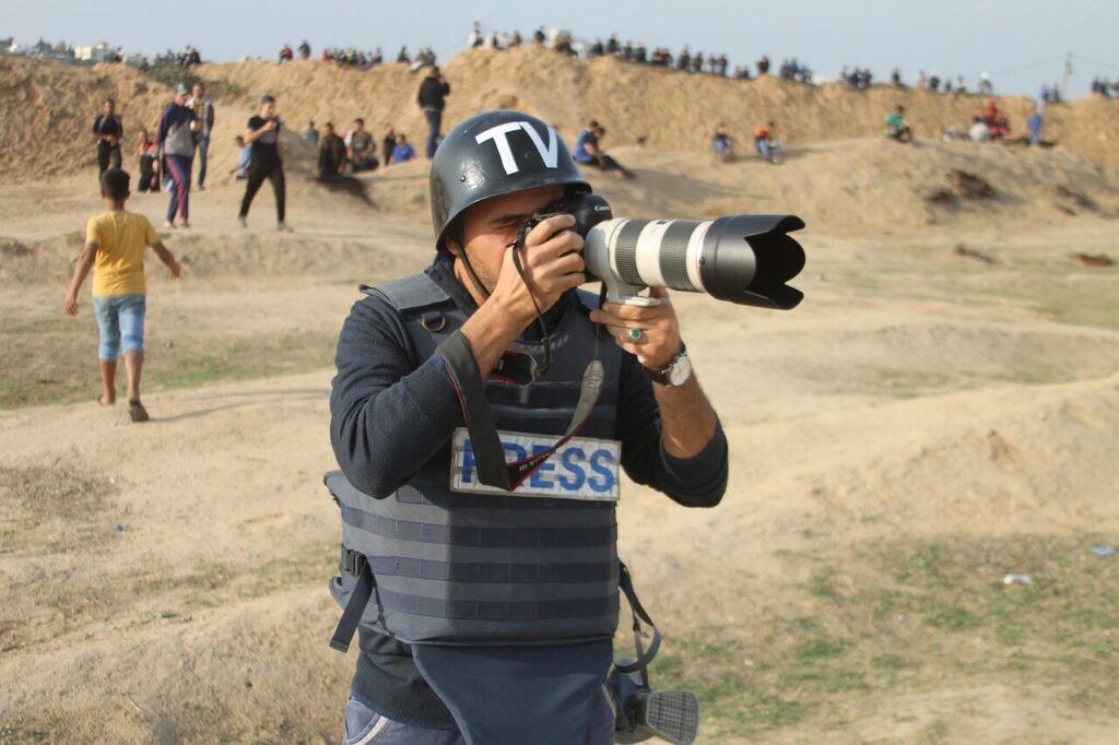 gaza, press, danger, palestine, human, war, concepts, mask, overview, portrait, helmets, cameraman, police, young, camera, evacuation, news